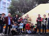 Sunny Chan and family, Ranee K. and students of SCAD Hong Kong create a mural painting.